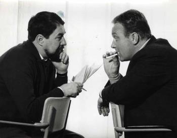 Portretfoto van Kees Brusse (rechts) en onbekend; Foto Foto