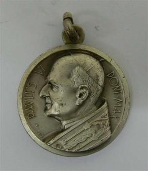 Medaille houdende een afbeelding van paus Paulus VI, met tekst: 'Paulus VI Pont. Max'
Keerzijde houdende een afbeelding van de H. Christoffel; Medaille Medaille